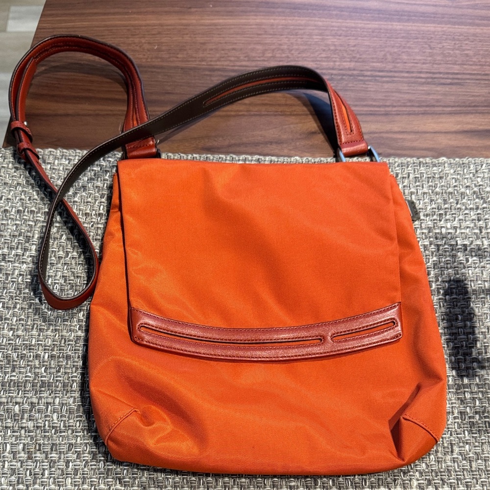 Tumi Orange Nylon Crossbody with Brown Leather Trim and Adjustable Strap